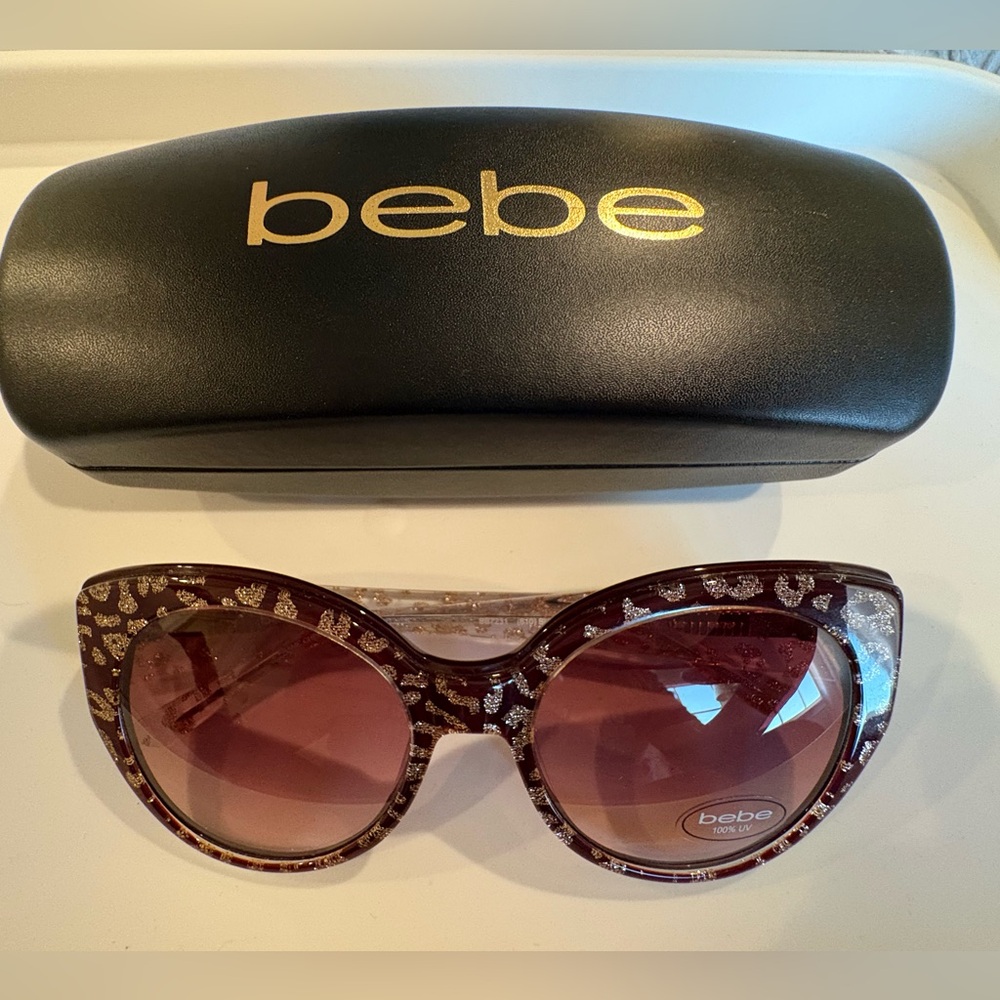 Bebe Women's Glittery Burgundy Animal Print Sunglasses